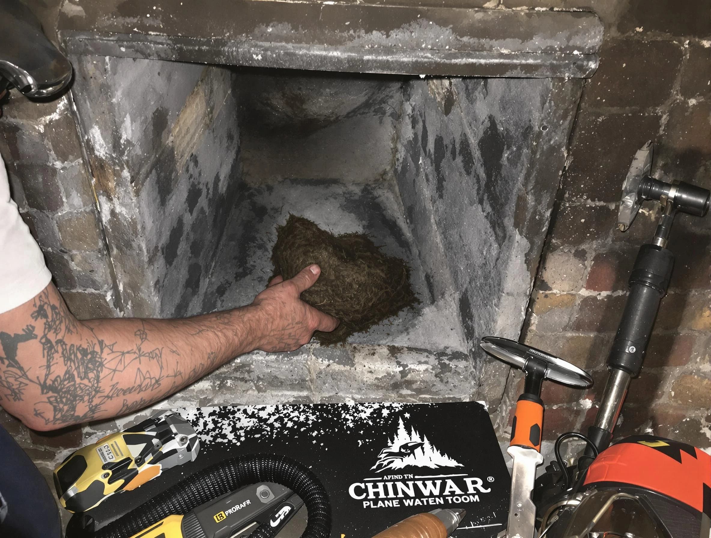 Dove Valley Chimney Sweep safely removing debris and screening chimney in Dove Valley, CO
